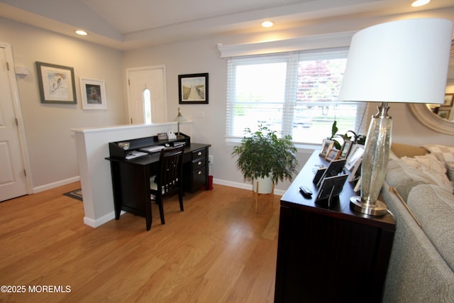 office area featuring baseboards, recessed lighting, light wood-style floors, and vaulted ceiling