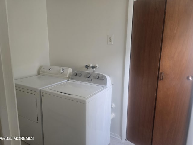 laundry room with laundry area and washing machine and dryer
