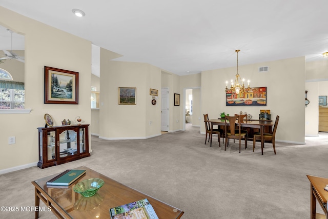 dining room with visible vents, carpet flooring, baseboards, and an inviting chandelier