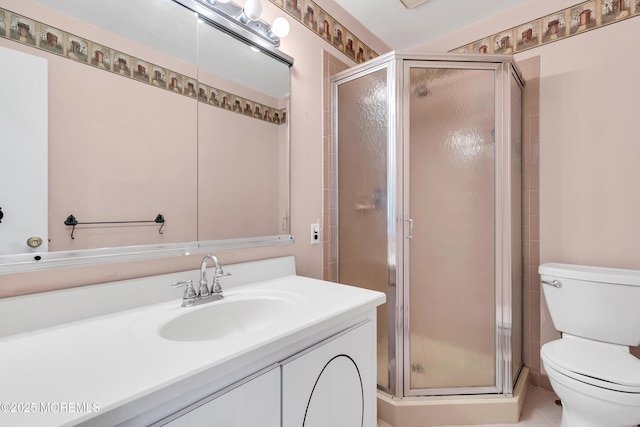 8A Lafayette Dr, Whiting, NJ 08759 - bathroom featuring a stall shower, vanity, toilet, and tile patterned flooring