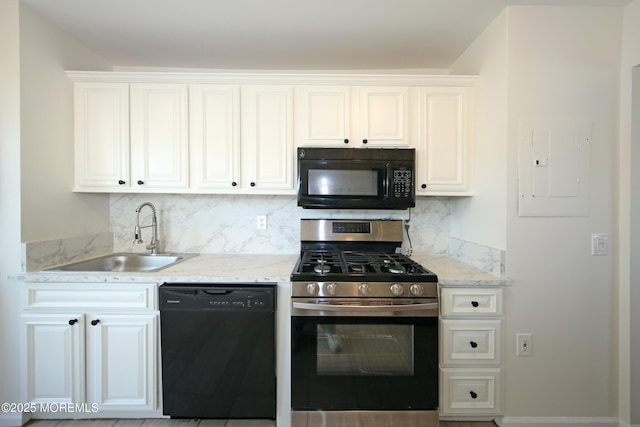 kitchen featuring tasteful backsplash, black appliances, electric panel, a sink, and white cabinetry