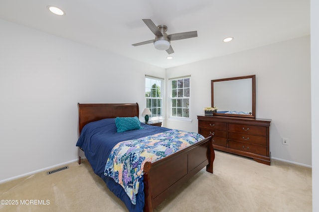bedroom featuring recessed lighting, ceiling fan, visible vents, baseboards, and light colored carpet