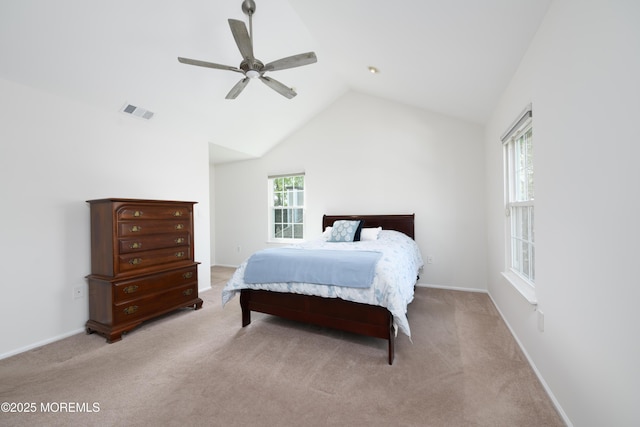 bedroom featuring lofted ceiling, light colored carpet, visible vents, ceiling fan, and baseboards