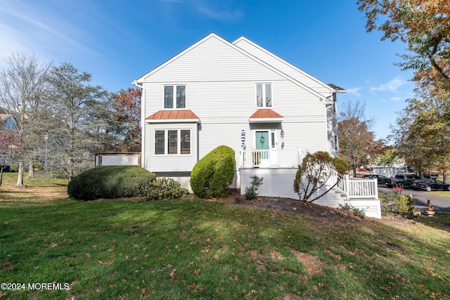 291 Marigold Ct, Toms River, NJ 08753 - exterior space featuring a lawn, a standing seam roof, and metal roof