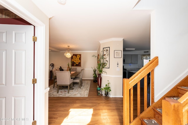 291 Marigold Ct, Toms River, NJ 08753 - interior space featuring wood finished floors, stairs, ornamental molding, baseboards, and a notable chandelier