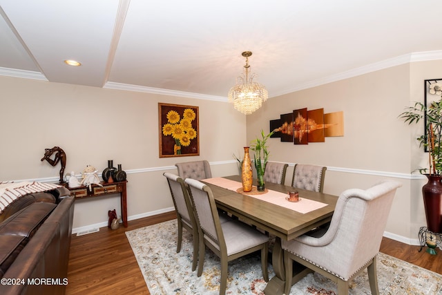 291 Marigold Ct, Toms River, NJ 08753 - dining space with wood finished floors, an inviting chandelier, and ornamental molding