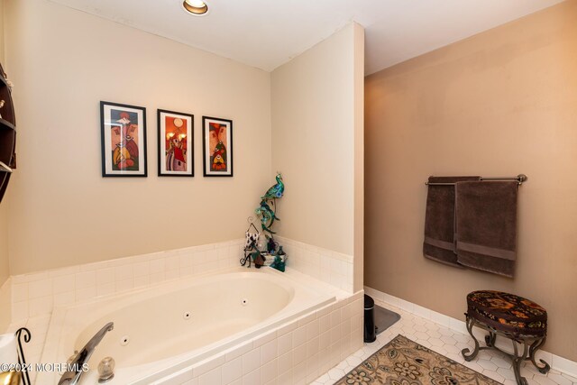 291 Marigold Ct, Toms River, NJ 08753 - bathroom featuring tile patterned flooring, a jetted tub, and baseboards