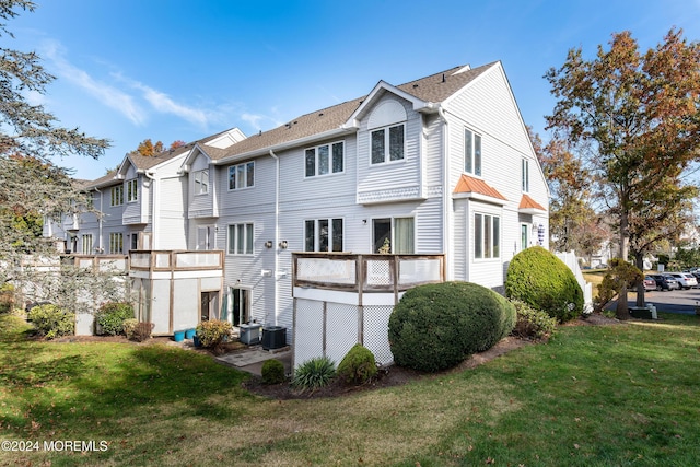 291 Marigold Ct, Toms River, NJ 08753 - rear view of house with a lawn and central AC unit