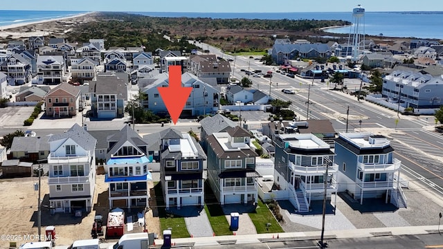 aerial view with a residential view and a water view