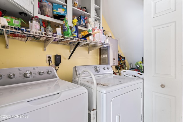 laundry room featuring washer and clothes dryer and laundry area