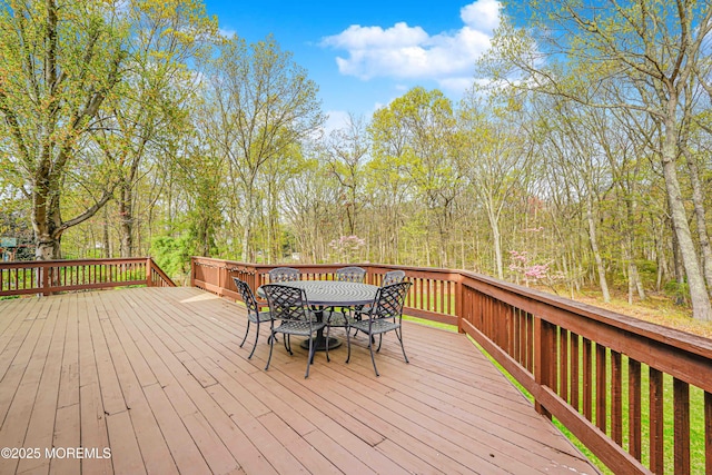deck featuring outdoor dining space