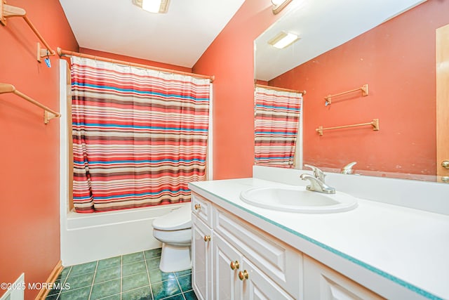 bathroom featuring vanity, tile patterned flooring, toilet, and shower / bath combo with shower curtain