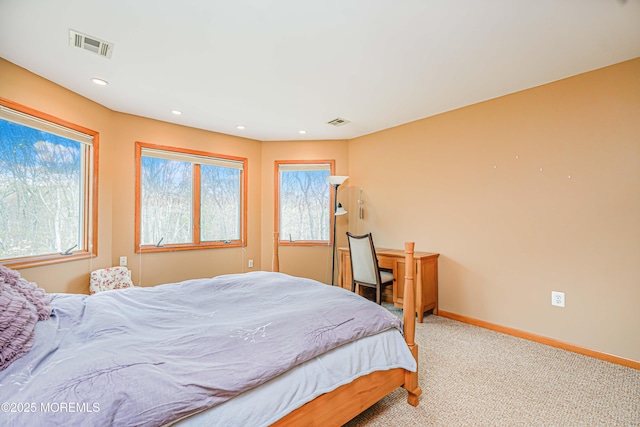 bedroom with baseboards, carpet, recessed lighting, and visible vents