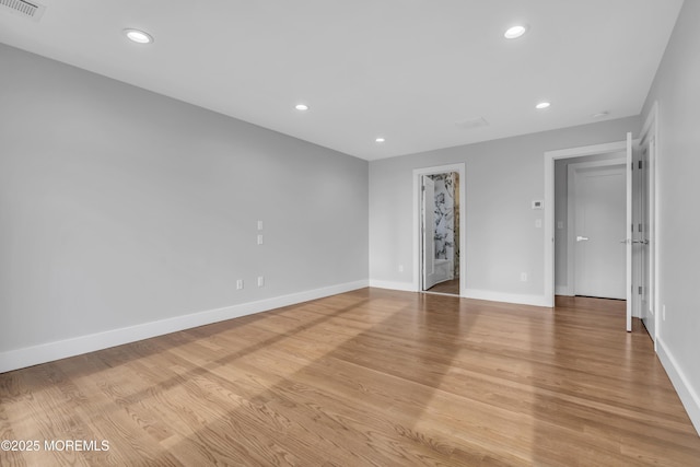 interior space with visible vents, recessed lighting, and baseboards