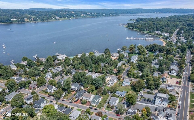 aerial view featuring a water view and a residential view