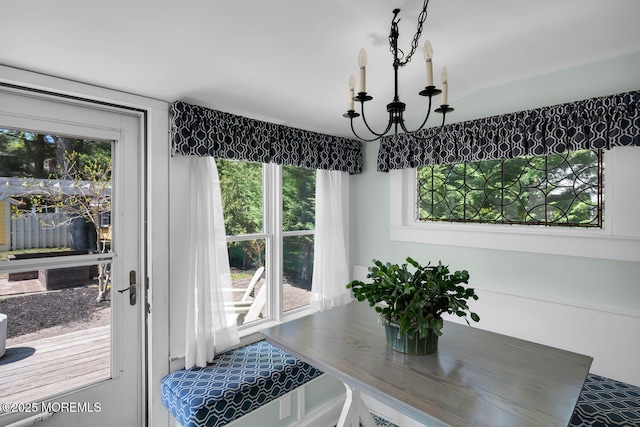 dining area with an inviting chandelier and a healthy amount of sunlight