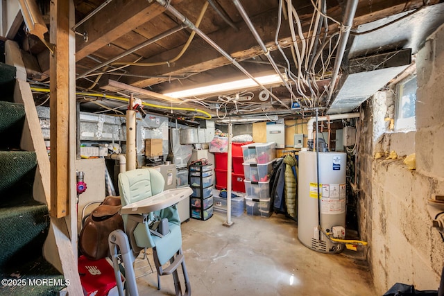 unfinished basement featuring gas water heater