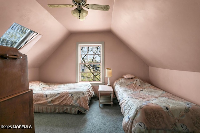 bedroom with carpet floors, a ceiling fan, and lofted ceiling