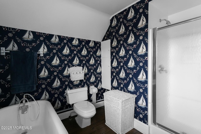 bathroom featuring toilet, wallpapered walls, wood finished floors, a tub to relax in, and a stall shower