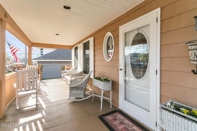 property entrance featuring covered porch