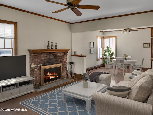 50 Bridge Ave, Bay Head, NJ 08742 - living room with ceiling fan, plenty of natural light, wood finished floors, and ornamental molding
