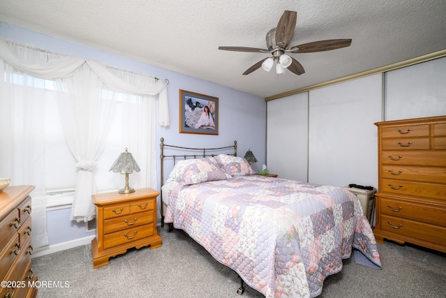 102 Buckingham Dr, Jackson, NJ 08527 - carpeted bedroom with a closet, ceiling fan, and a textured ceiling