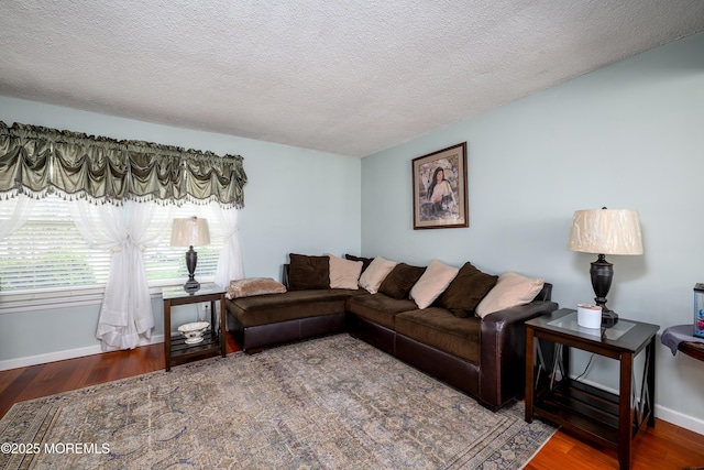 102 Buckingham Dr, Jackson, NJ 08527 - living room featuring wood finished floors, baseboards, and a textured ceiling