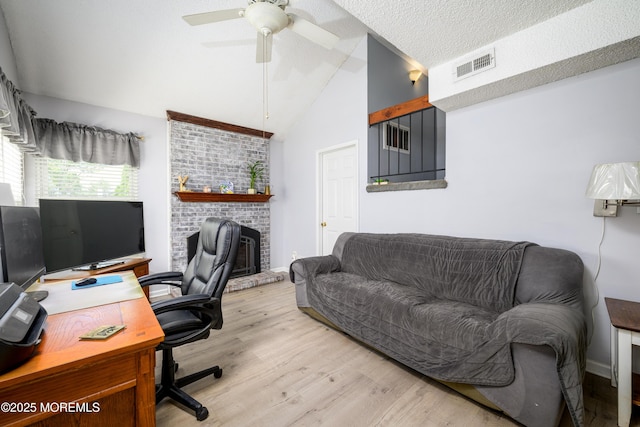 102 Buckingham Dr, Jackson, NJ 08527 - office space with wood finished floors, a ceiling fan, vaulted ceiling, and a fireplace