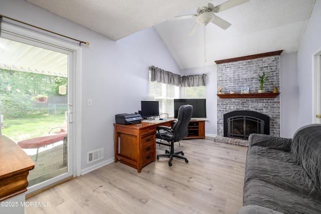 102 Buckingham Dr, Jackson, NJ 08527 - office featuring vaulted ceiling, wood finished floors, ceiling fan, a fireplace, and baseboards