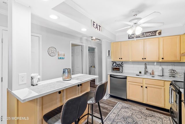 kitchen featuring a sink, range with electric cooktop, dishwasher, and light brown cabinets