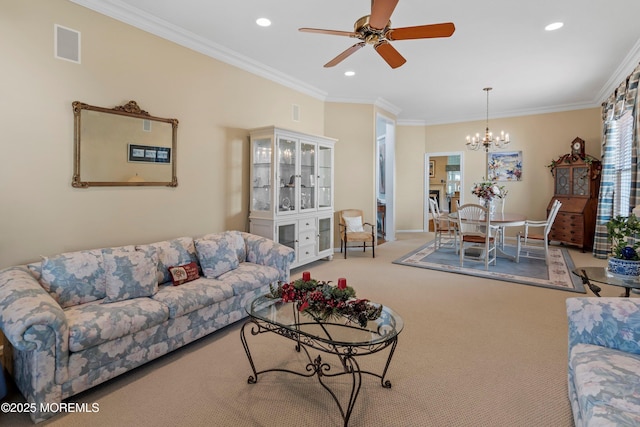 carpeted living room featuring crown molding, recessed lighting, a chandelier, ceiling fan, and baseboards
