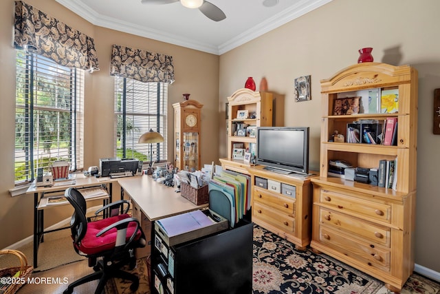 office area featuring crown molding, ceiling fan, and baseboards