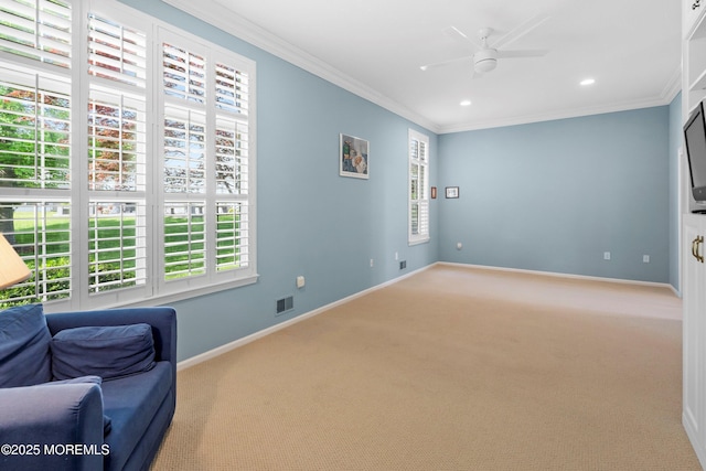 living area with ornamental molding, carpet flooring, baseboards, ceiling fan, and recessed lighting