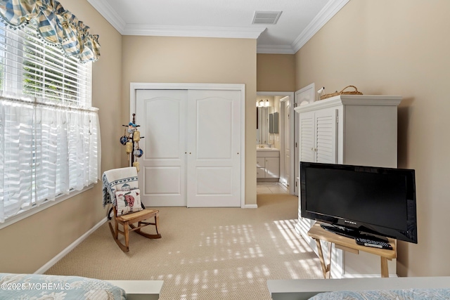living area featuring ornamental molding, light carpet, and baseboards