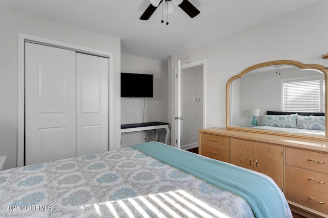 bedroom with a closet and a ceiling fan