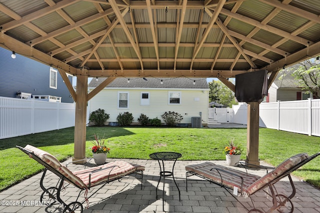 view of patio / terrace featuring a fenced backyard, a gazebo, and cooling unit