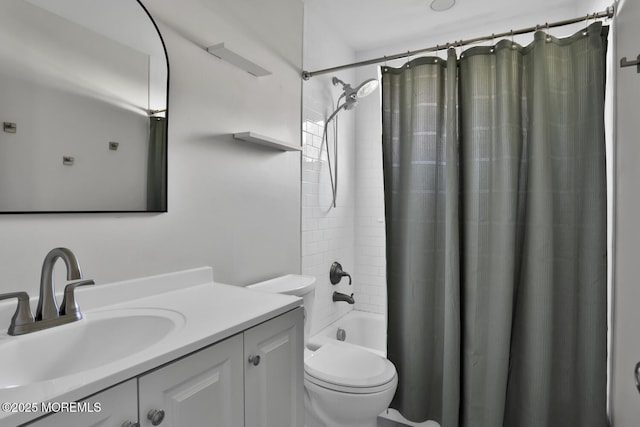 full bathroom featuring toilet, shower / bathtub combination with curtain, and vanity