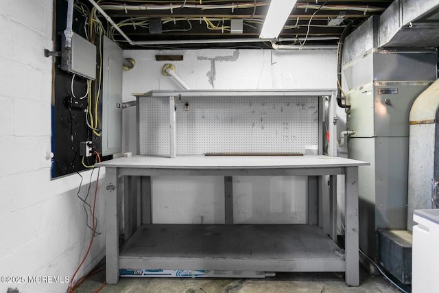 interior space with concrete block wall