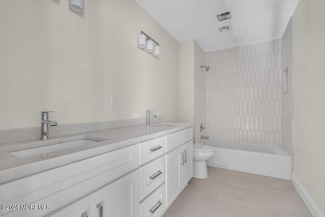 full bath with shower / bath combination, a sink, double vanity, and toilet