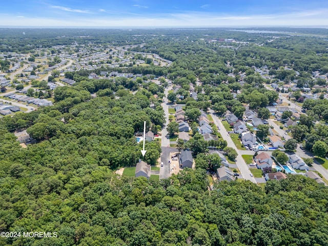 aerial view featuring a view of trees