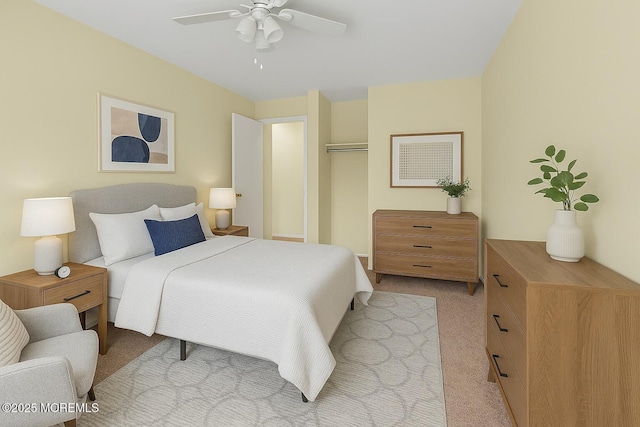 bedroom with ceiling fan and light carpet