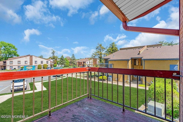 balcony featuring a residential view