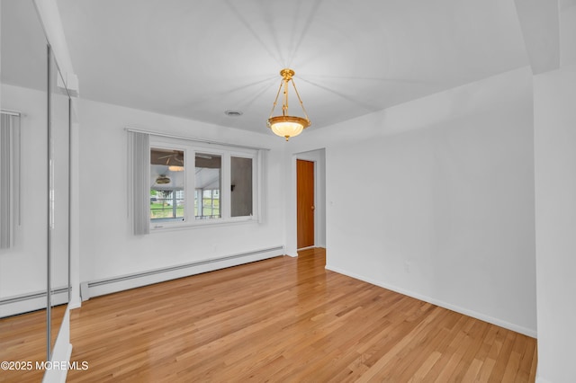 4 Norway Rd, Toms River, NJ 08757 - unfurnished room featuring light wood-type flooring, baseboards, and a baseboard heating unit