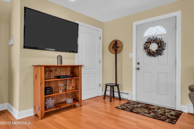 86 Cox Cro Rd, Toms River, NJ 08755 - entrance foyer featuring wood finished floors, baseboards, and a baseboard heating unit