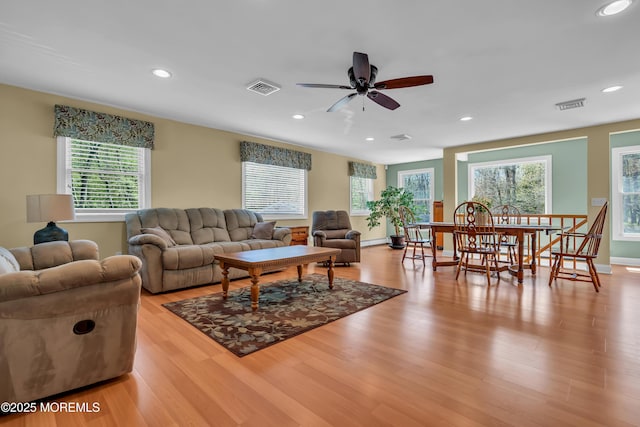 86 Cox Cro Rd, Toms River, NJ 08755 - living area with visible vents, ceiling fan, and a wealth of natural light