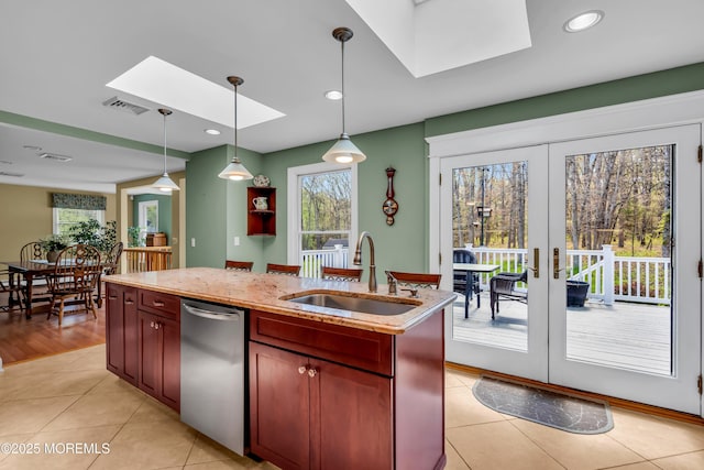 86 Cox Cro Rd, Toms River, NJ 08755 - kitchen with french doors, a skylight, dishwasher, a sink, and light tile patterned floors