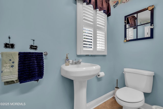 86 Cox Cro Rd, Toms River, NJ 08755 - half bathroom featuring baseboards, a sink, tile patterned floors, and toilet