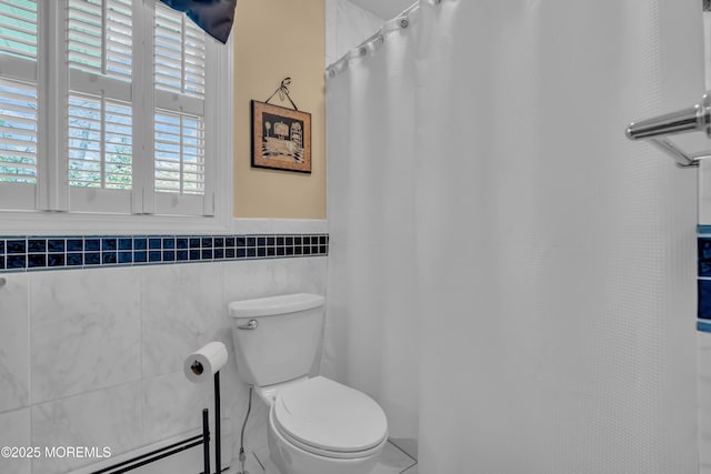 86 Cox Cro Rd, Toms River, NJ 08755 - bathroom with toilet, tile walls, a wainscoted wall, a shower with curtain, and a baseboard radiator