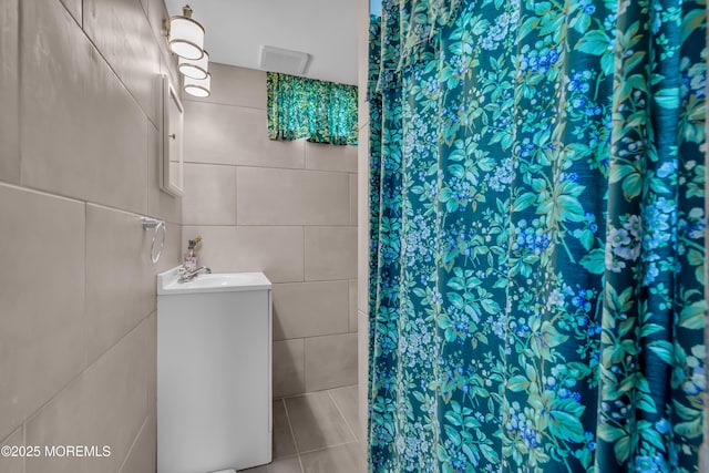 86 Cox Cro Rd, Toms River, NJ 08755 - bathroom with vanity, a shower with curtain, and tile walls