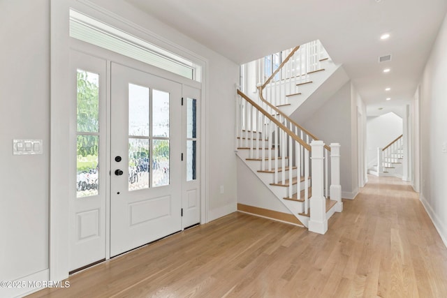 24 Baruch Dr, Long Branch, NJ 07740 - entrance foyer with stairs, light wood-type flooring, and recessed lighting